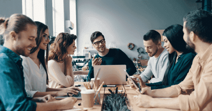 a team in meeting doing classic team building problem solving