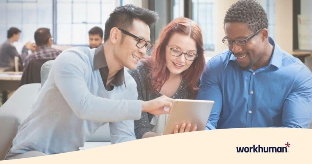 coworkers discussing DEI activities and remote team building using a diversity calendar