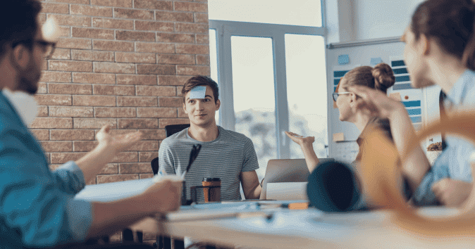 funny employees playing team-building games