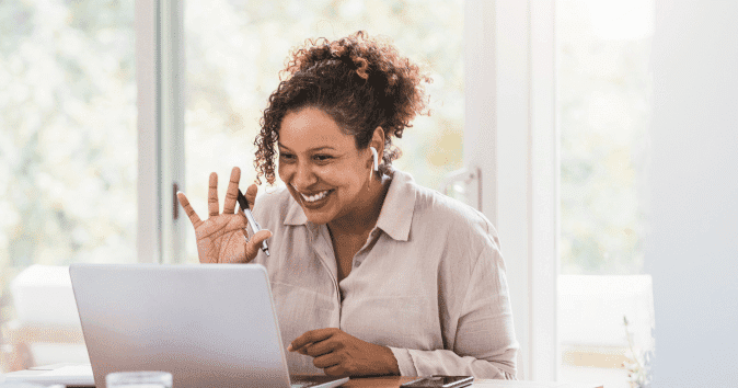 an employee doing fun virtual team building activity