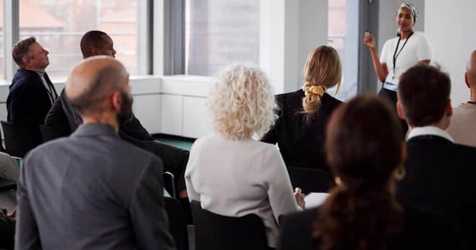 small group of people attending the office session