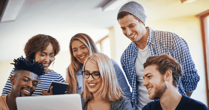 Group of young employees are happy to achieve their goals