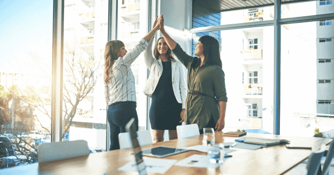A team celebrating success in a calm work environment