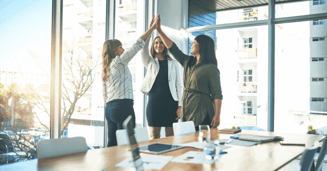 A team celebrating success in a calm work environment