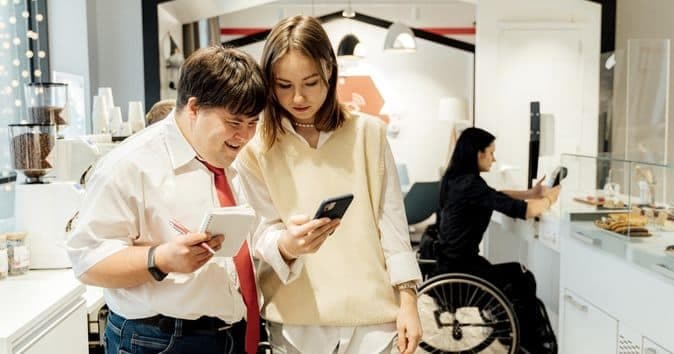 a team of employees collaborates and engages in work activities, highlighting strategies to boost employee morale and productivity