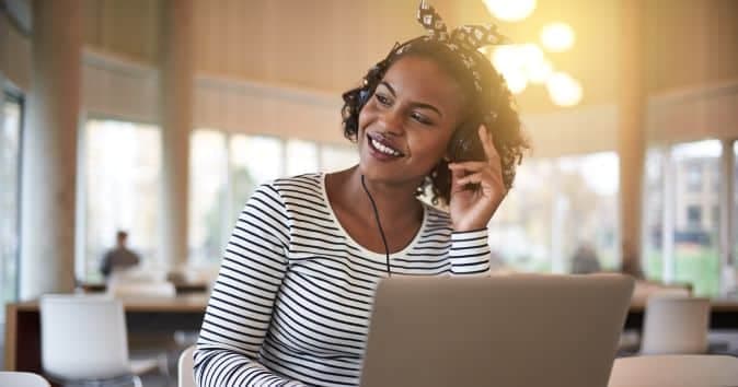 employees dancing in office