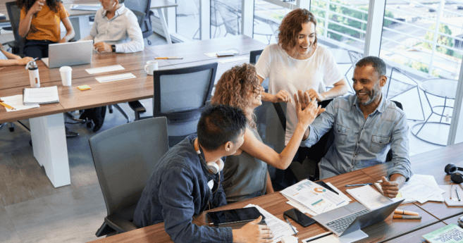 manager and employees discussing professional interests