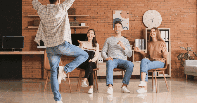 group of employee playing fun team-building games