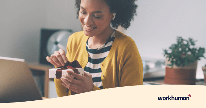 an employee opening a gift
