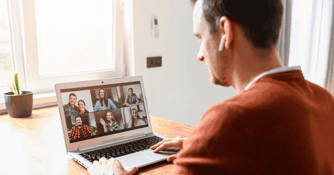 a-man-using-one-of-the-virtual-meetings-tools-.png