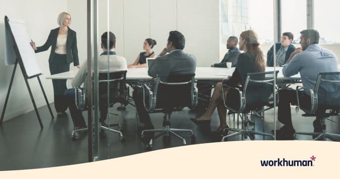 A team of executives discusses financial and operational planning as part of the enterprise performance management process