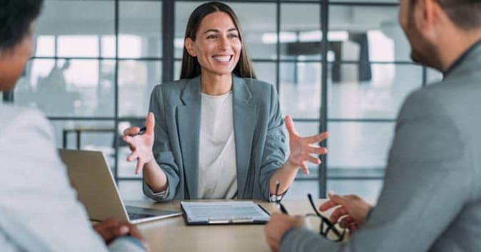 Women talking with colleagues