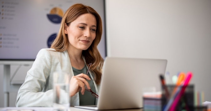 Female employee learning how to be an inclusive leader in a Zoom training