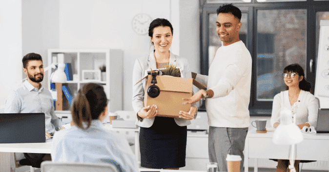 an employee introduces a new-hire to the team