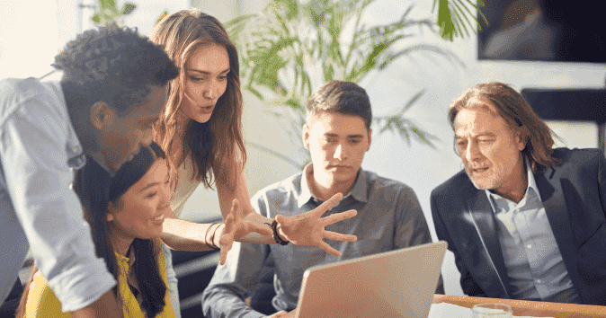 A-group-of-employees-in-a-brainstorming-session-in-a-startup-company-showing-good-performance-and-productivity