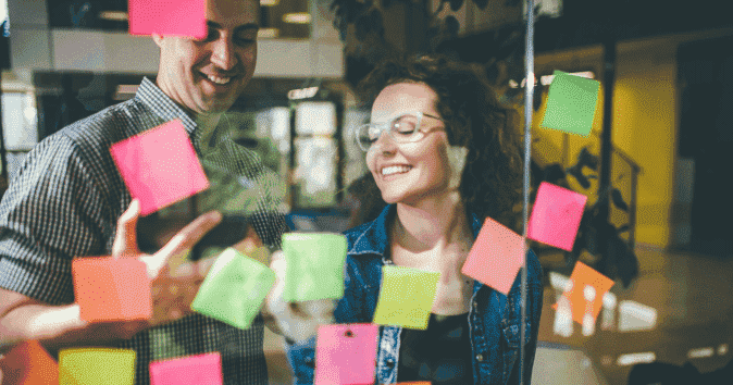 Close-up of team coming up with new ideas in a brainstorming session