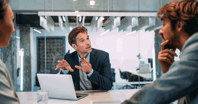 Mentor discussing leadership position and job performance